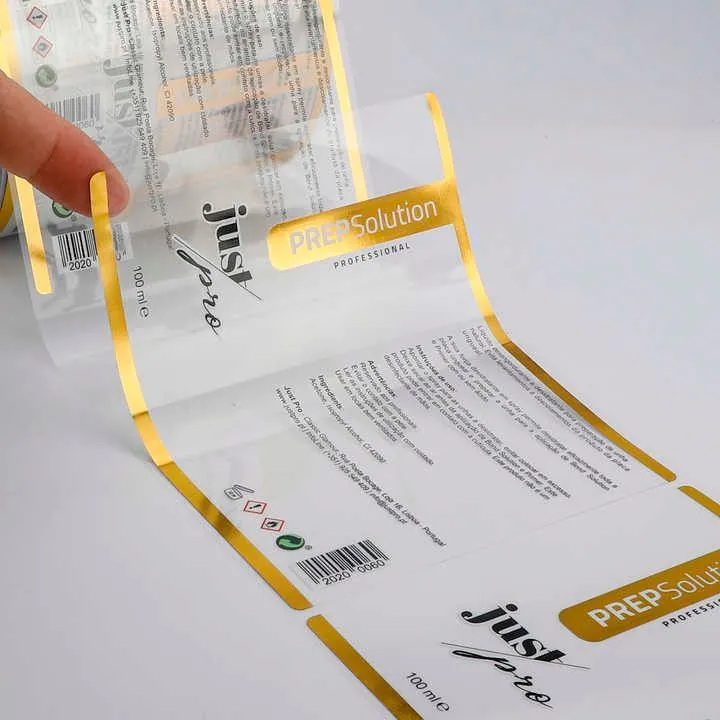 Clear film labels for glass, plastic and transparent containers