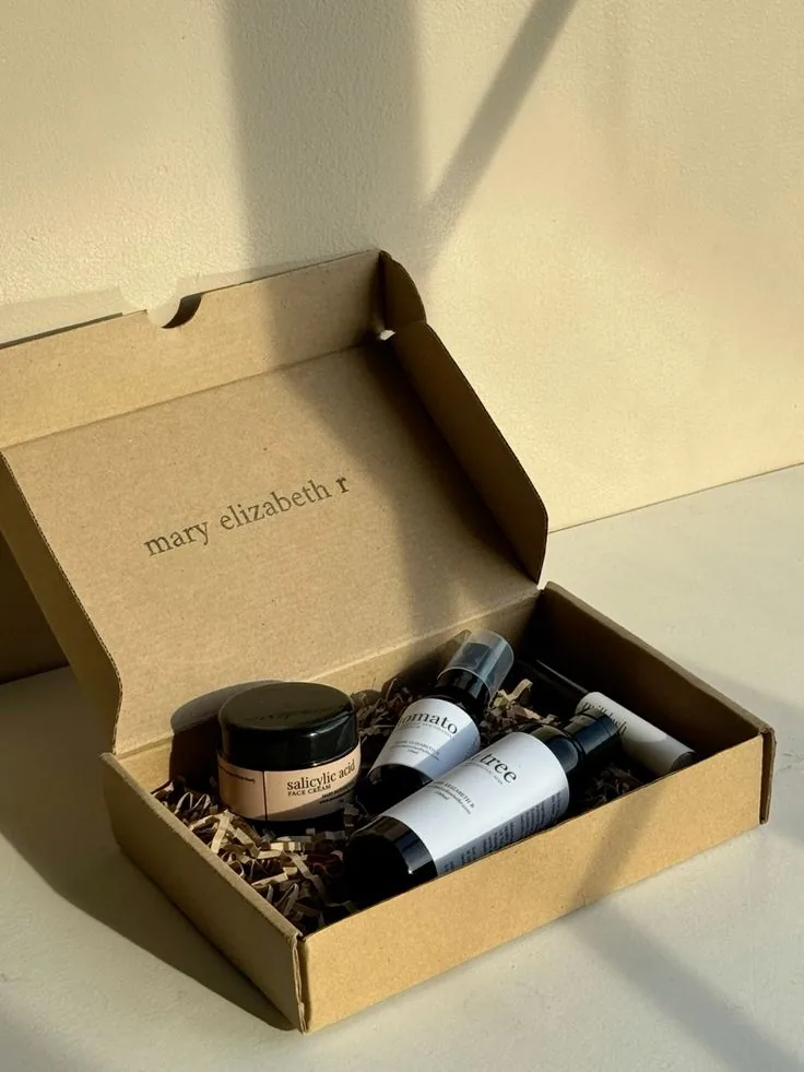 Labels and paper packaging set for skincare products in a kraft mailer box